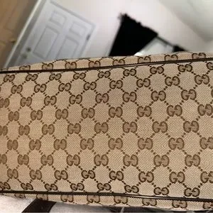 Authentic Gucci drawstring backpack, used about 3 times. Dust bag included Gucci | Bags | Authentic Gucci Drawstring Backpack Used  main image 4